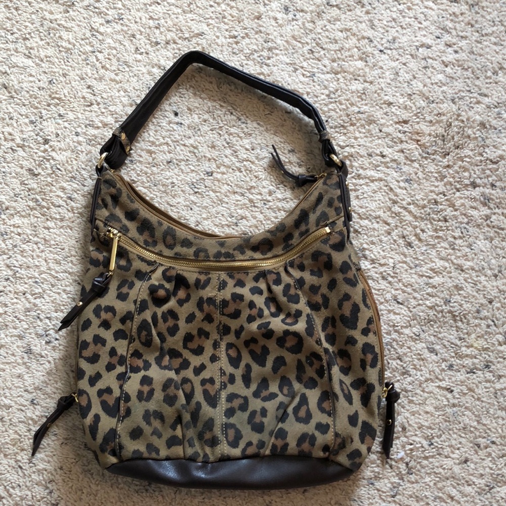 Brown tignanello Leopard purse